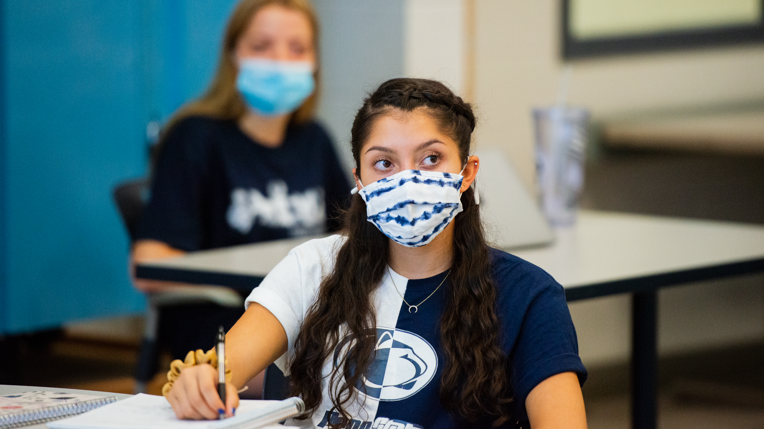 Students in class wearing masks.