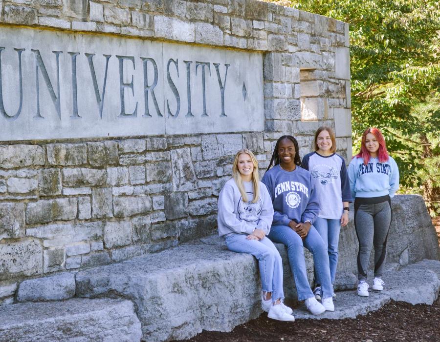 Instagram Ambassadors together at the stone Pennsylvania State University sign