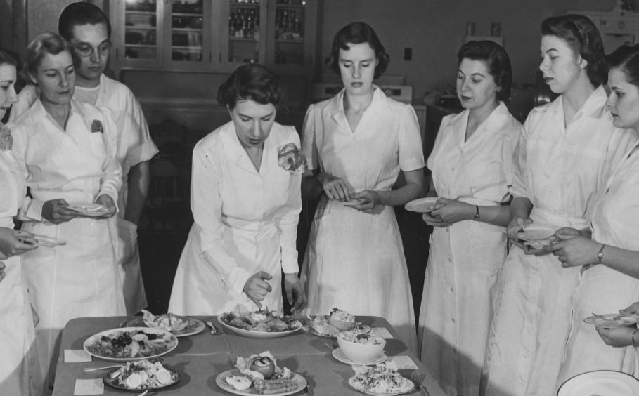 Historical image of a class on food presentation. 