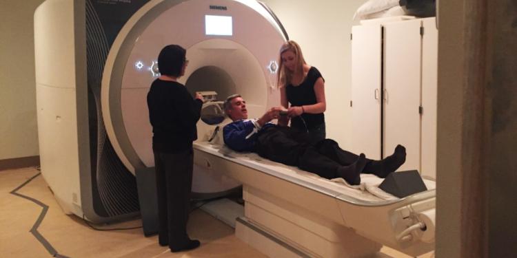 Research participant prepares for fMRI