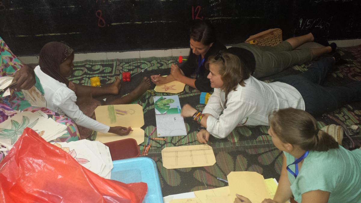 =GHM students reading with kids
