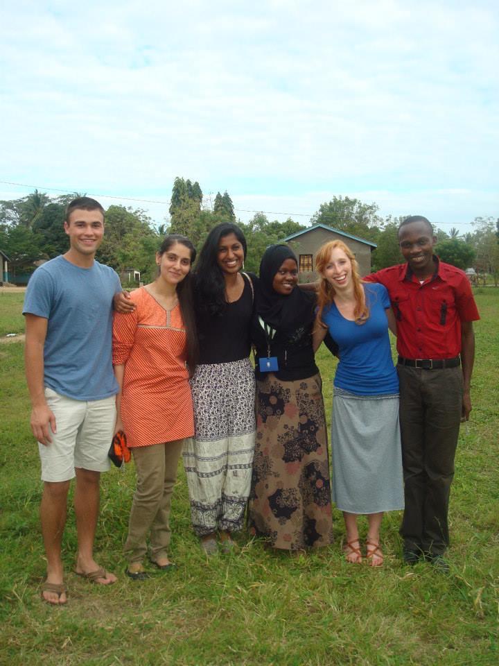 =Group of students standing in a field in Tanzania